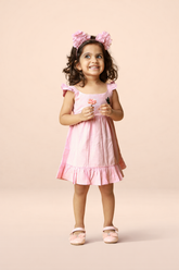 Pink cotton baby girl dress with embroidered bunny motif, flutter sleeves and tiered flared skirt by Mini Tantini