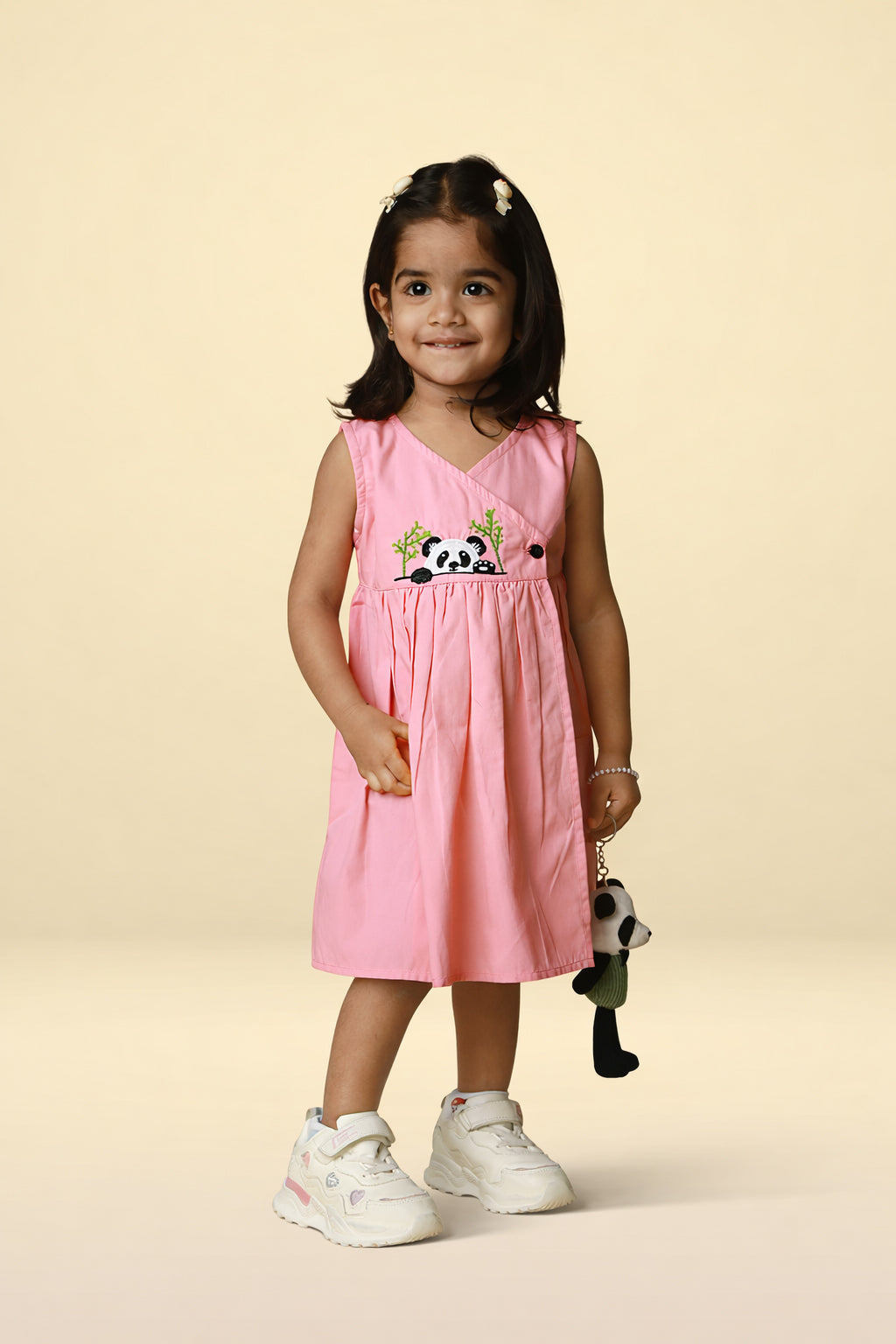 Pink cotton baby girl dress with cute panda embroidery, sleeveless wrap neckline and flared skirt by Mini Tantini