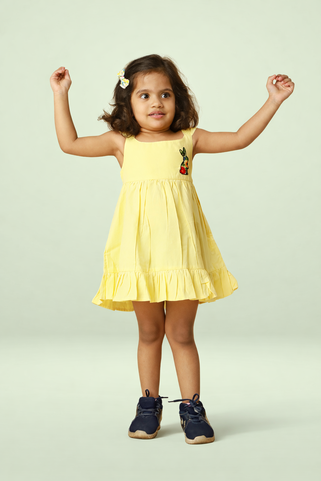 Yellow cotton baby girl dress with embroidered bunny motif, flutter sleeves and tiered flared skirt by Mini Tantini