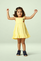 Yellow cotton baby girl dress with embroidered bunny motif, flutter sleeves and tiered flared skirt by Mini Tantini