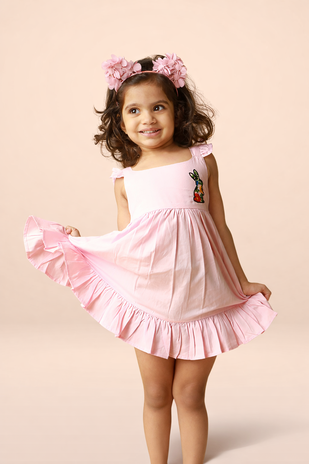 Sleeveless pink baby girl frock with flutter straps and embroidered bunny detail