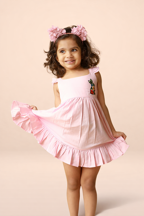 Sleeveless pink baby girl frock with flutter straps and embroidered bunny detail